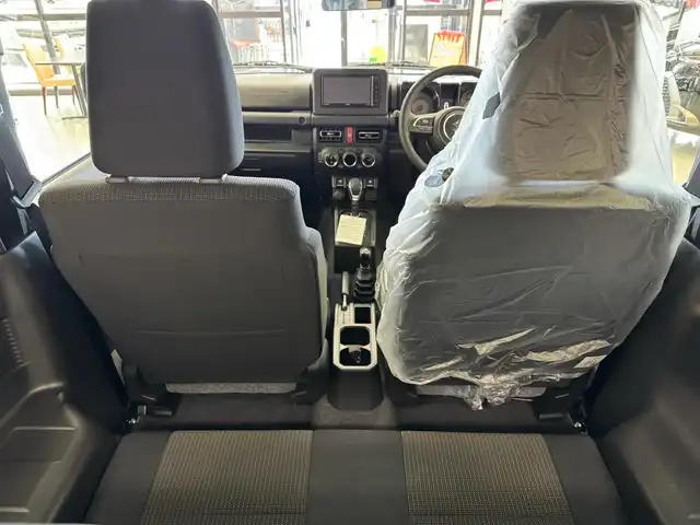 スズキ ジムニー XC 滋賀県 2025(令7)年 0.1万km未満 ミディアムグレー ワンオーナー/イクリプスフルセグナビ/　フルセグ Bluetooth CD DVD SDREC AM FM/バックカメラ/デュアルセンサーブレーキサポート/誤発進抑制機能/車線逸脱警報機能/ふらつき警報機能/ハイビームアシスト/先行車発進お知らせ機能/標識認識機能/エマージェンシーストップシグナル/オートライトシステム/ライト自動消灯システム/ヒーテッドドアミラー/純正LEDヘッドライト/純正16インチアルミ/スマートキー×2/プッシュスタート/保証書/取説/