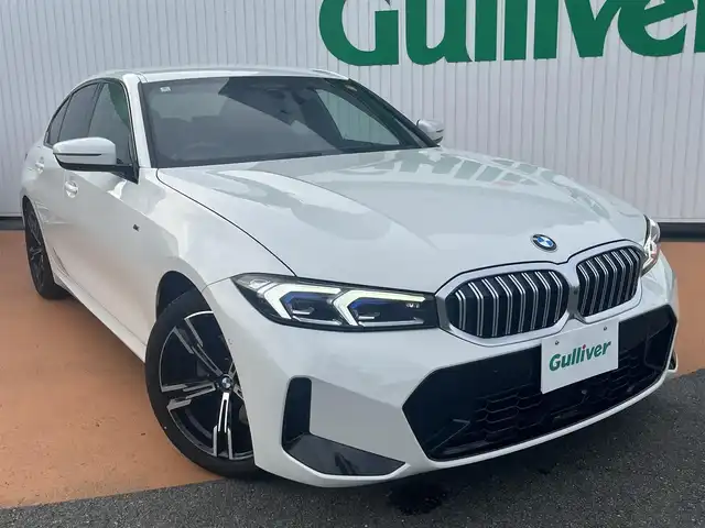 ＢＭＷ ＢＭＷ ３２０ｉ Mスポーツ 三重県 2024(令6)年 1.6万km アルピンホワイトⅢ ワンオーナー/パーキングアシストプラス/ドライビングアシストプロフェッショナル/アクティブクルーズコントロール/14.9インチナビゲーション/12.3インチマルチディスプレイメーター/HiFiスピーカーシステム/ワイヤレスチャージング/360度カメラ/アダプティブLEDヘッドランプ/パワーシート・シートヒーター/225/45R18.255/40R18タイヤ/パワートランク