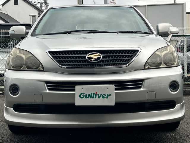 トヨタ ハリアー ハイブリッド プレミアム Sパッケージ 神奈川県 2005(平17)年 15.8万km ダークグレーマイカメタリック コーナーセンサー/クルーズコントロール/オートライト/前後フォグランプ/パワーシート/バックカメラ/サンルーフ/横滑り防止装置/運転席・助手席シートヒーター/フェンダーミラー/HDDナビ/フルセグテレビ/プッシュスタート/パワーバックドア/イージークローザー/ETC/ドアバイザー/電動格納ミラー/ローダウン純正スプリングあり