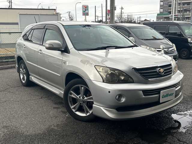 トヨタ ハリアー ハイブリッド プレミアム Sパッケージ 神奈川県 2005(平17)年 15.8万km ダークグレーマイカメタリック コーナーセンサー/クルーズコントロール/オートライト/前後フォグランプ/パワーシート/バックカメラ/サンルーフ/横滑り防止装置/運転席・助手席シートヒーター/フェンダーミラー/HDDナビ/フルセグテレビ/プッシュスタート/パワーバックドア/イージークローザー/ETC/ドアバイザー/電動格納ミラー/ローダウン純正スプリングあり