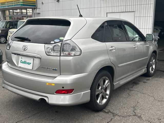 トヨタ ハリアー ハイブリッド プレミアム Sパッケージ 神奈川県 2005(平17)年 15.8万km ダークグレーマイカメタリック コーナーセンサー/クルーズコントロール/オートライト/前後フォグランプ/パワーシート/バックカメラ/サンルーフ/横滑り防止装置/運転席・助手席シートヒーター/フェンダーミラー/HDDナビ/フルセグテレビ/プッシュスタート/パワーバックドア/イージークローザー/ETC/ドアバイザー/電動格納ミラー/ローダウン純正スプリングあり