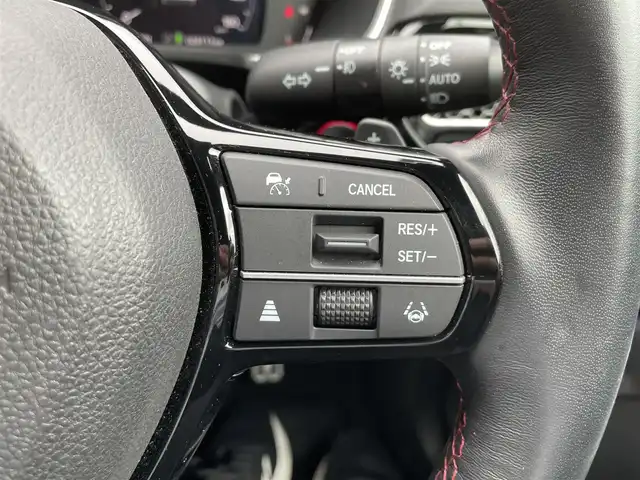 ホンダ シビック e:HEV 長崎県 2023(令5)年 2.9万km プレミアムクリスタルレッドM ワンオーナー/純正ナビ/BOSEサウンド/前後ドライブレコーダー/ハーフレザーシート/前席シートヒーター/前席パワーシート/ホンダセンシング/ブラインドスポットモニター/レーンキープアシスト/クリアランスソナー/パドルシフト/オートライト/LEDヘッドライト/ステアリングスイッチ/バックカメラ/レーダークルーズコントロール/置くだけ充電/リアゲートスポイラー