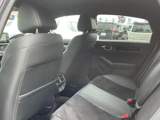 ホンダ シビック e:HEV 長崎県 2023(令5)年 2.9万km プレミアムクリスタルレッドM ワンオーナー/純正ナビ/BOSEサウンド/前後ドライブレコーダー/ハーフレザーシート/前席シートヒーター/前席パワーシート/ホンダセンシング/ブラインドスポットモニター/レーンキープアシスト/クリアランスソナー/パドルシフト/オートライト/LEDヘッドライト/ステアリングスイッチ/バックカメラ/レーダークルーズコントロール/置くだけ充電/リアゲートスポイラー