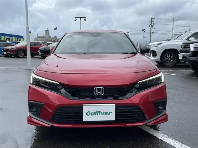 ホンダ シビック e:HEV 長崎県 2023(令5)年 2.9万km プレミアムクリスタルレッドM ワンオーナー/純正ナビ/BOSEサウンド/前後ドライブレコーダー/ハーフレザーシート/前席シートヒーター/前席パワーシート/ホンダセンシング/ブラインドスポットモニター/レーンキープアシスト/クリアランスソナー/パドルシフト/オートライト/LEDヘッドライト/ステアリングスイッチ/バックカメラ/レーダークルーズコントロール/置くだけ充電/リアゲートスポイラー