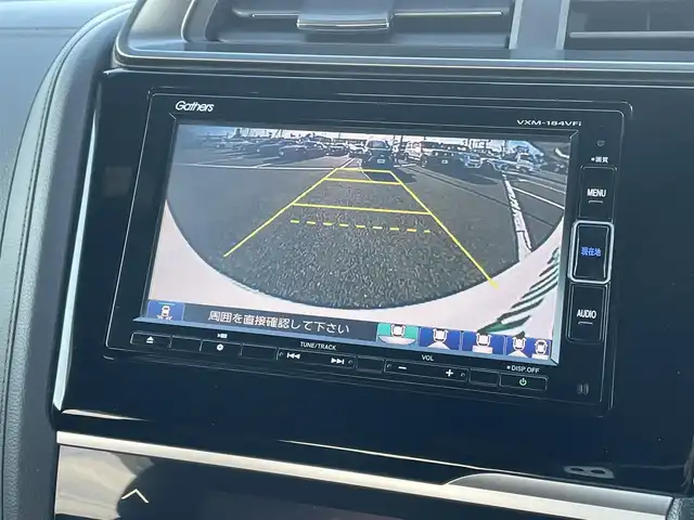 ホンダ フィット ハイブリット S ホンダセンシング 鳥取県 2018(平30)年 5.7万km プレミアムホワイトパールⅡ 純正ナビ／ＴＶ／ＤＶＤ／ＣＤ／ＢＴ/バックカメラ/ビルトインＥＴＣ/ドライブレコーダー/ホンダセンシング/レーダークルーズコントロール/レーンアシスト/パドルシフト/ＬＥＤヘットライト/フォグライト/純正エアロパーツ/リヤルーフスポイラー/純正１６インチアルミホイール/プッシュエンジンスタート/アイドリングストップ/フロアマット/ドアバイザー