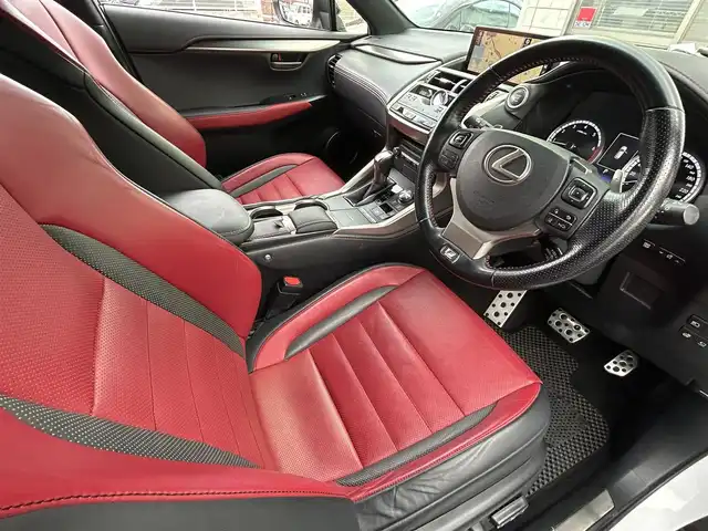 レクサス ＮＸ 300 Fスポーツ 福岡県 2018(平30)年 6万km ホワイトノーヴァガラスフレーク TRDエアロ（フロント）/ムーンルーフ/純正10.3インチHDDナビ/　(AM/FM/CD/DVD/Bluetooth/AUX/フルセグTV)/バックカメラ/レクサスセーフティーセンス/・プリクラッシュセーフティーセンス/・レーンディパーチャーアラート/・レーダークルーズコントロール（全車速追従機能付き）/・オートマチックハイビーム/・パーキングサポートアシスト/・ブラインドスポットモニター/・先行者発進アラーム/・横滑り防止装置/オートライト/黒/赤レザーシート/NEXTEC前後方トライブレコーダー【NX-DRW22】/パワーバックドア/ステアリングヒーター/シートヒーター（運転席＋助手席）/シートベンチレーター（運転席＋助手席）/シートメモリー/純正18インチアルミホイール/アクティブサウンドコントロール/ヘッドライトウォッシャーノズル/ビルトインETC2.0/プッシュスタート/パドルシフト/nanoe付エアコン/クリアランスソナー/コーナーセンサー/盗難防止装置/USBポート×2/カードキー×1/スペアキー×1/保証書/取扱説明書/ナビ取扱説明書