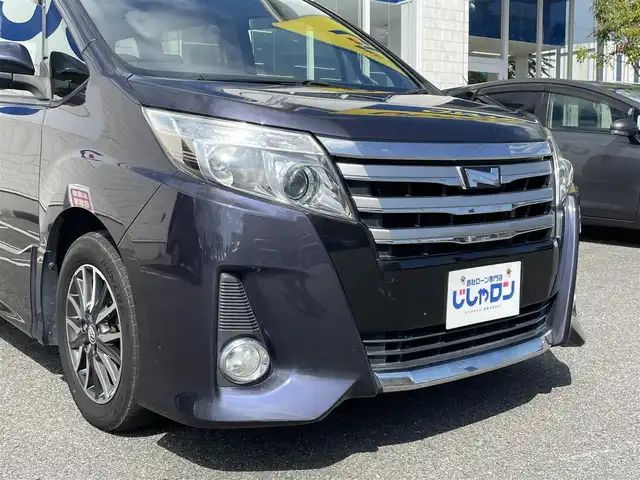 トヨタ ノア Si 佐賀県 2014(平26)年 13.1万km ダークバイオレットマイカメタリック 自社ローンご希望の方は別途その旨お申付け下さい/こちらは現金またはオートローンご利用時の価格です/ディーラーop8インチナビ【NSZT-Y64T】/（Bluetooth/フルセグTV/CD/DVD/AM/FM）/純正11インチフリップダウンモニター【V11T-R62C】/バックカメラ/両側パワースライドドア/LEDヘッドライト/デュアルエアコン/フルオートウィンドウ/革巻きステアリング/ステアリングスイッチ/純正16AW/純正フロアマット/電格ミラー/ドアバイザー/プッシュスタート/スマートキー/本体取扱説明書/ナビ取扱説明書/記録簿