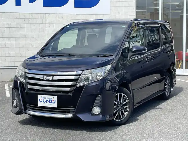 トヨタ ノア Si 佐賀県 2014(平26)年 13.1万km ダークバイオレットマイカメタリック 自社ローンご希望の方は別途その旨お申付け下さい/こちらは現金またはオートローンご利用時の価格です/ディーラーop8インチナビ【NSZT-Y64T】/（Bluetooth/フルセグTV/CD/DVD/AM/FM）/純正11インチフリップダウンモニター【V11T-R62C】/バックカメラ/両側パワースライドドア/LEDヘッドライト/デュアルエアコン/フルオートウィンドウ/革巻きステアリング/ステアリングスイッチ/純正16AW/純正フロアマット/電格ミラー/ドアバイザー/プッシュスタート/スマートキー/本体取扱説明書/ナビ取扱説明書/記録簿