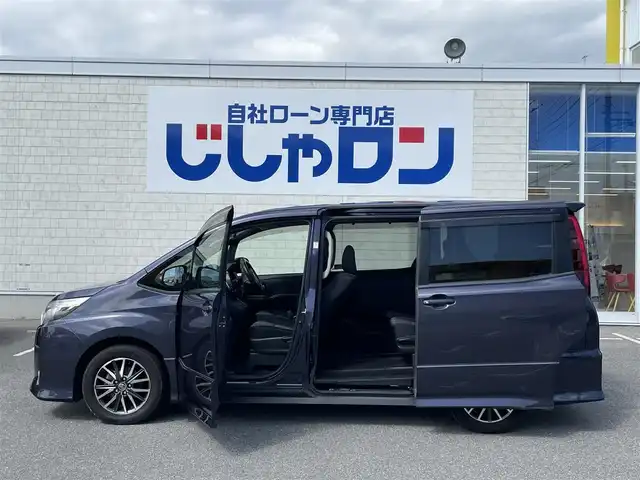 トヨタ ノア Si 佐賀県 2014(平26)年 13.1万km ダークバイオレットマイカメタリック 自社ローンご希望の方は別途その旨お申付け下さい/こちらは現金またはオートローンご利用時の価格です/ディーラーop8インチナビ【NSZT-Y64T】/（Bluetooth/フルセグTV/CD/DVD/AM/FM）/純正11インチフリップダウンモニター【V11T-R62C】/バックカメラ/両側パワースライドドア/LEDヘッドライト/デュアルエアコン/フルオートウィンドウ/革巻きステアリング/ステアリングスイッチ/純正16AW/純正フロアマット/電格ミラー/ドアバイザー/プッシュスタート/スマートキー/本体取扱説明書/ナビ取扱説明書/記録簿