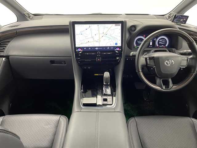 トヨタ ヴェルファイア ハイブリット エグゼクティブ ラウンジ 熊本県 2024(令6)年 7万km プラチナホワイトパールマイカ ワンオーナー　/禁煙車　/ユニバーサルステップ　/左右独立ムーンルーフ　/純正14インチディスプレイオーディオ（ApplCarPlay・AndroidAuto・BT・フルセグ・CD・DVD・USB・HDMI）/全方位ドライブレコーダー　/全周囲カメラ　/ビルトインＥＴＣ２．０　/両側パワースライドドア　/純正１４インチ後席フリップダウンモニター/パワーバックドア/トヨタセーフティーセンス/・プリクラッシュセーフティ/・フロントクロストラフィックアラート/・レーンチェンジアシスト/・レーントレーシングアシスト/・レーンディパーチャーアラート/・レーダークルーズコントロール/・プロアクティブドライビングアシスト/・ドライバー異常対応システム/・発進遅れ告知機能/・ブラインドスポットモニター/横滑り防止/アイドリングストップ/全席シートヒーター/全席エアーシート/前席パワーシート/メモリシート/nanoeX/前後クリアランスソナー/JBLサウンド/オットマン/置くだけ充電/オートライト/三眼LEDヘッドライト/フォグランプ/スマートキー/スペアキー1本/保証書/取扱説明書