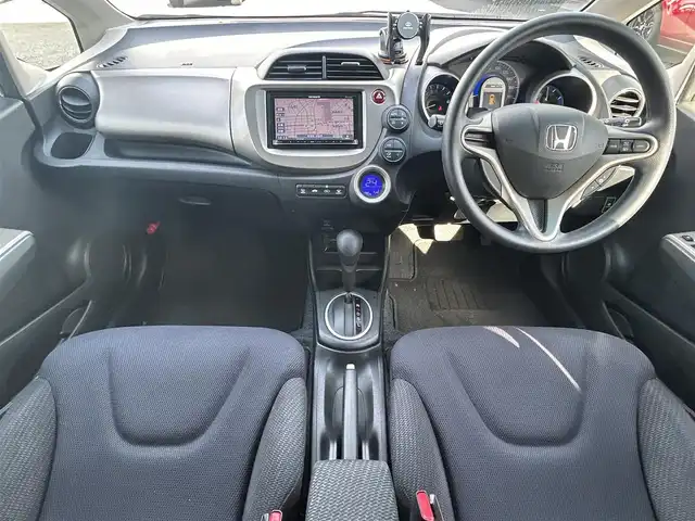 ホンダ フィット ハイブリット スマート セレクション 愛知県 2011(平23)年 15.6万km プレミアムホワイトパール ワンオーナー/社外7V型メモリナビ【Bluetooth SD ワンセグ　FM AM 品：AVIC-MRZ99】/ETC/ドライブレコーダー/オートライト/クルーズコントロール/自動駐車システム/ステアリングリモコン/電動格納ドアミラー/純正フロアマット/Wエアバック/取扱説明書