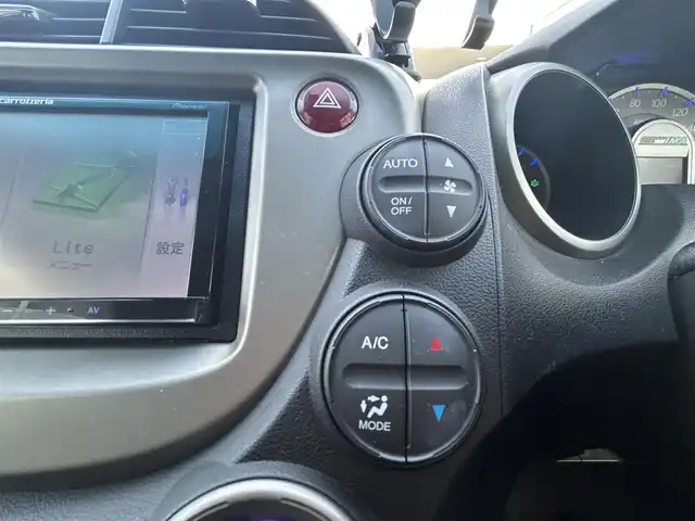 ホンダ フィット ハイブリット スマート セレクション 愛知県 2011(平23)年 15.6万km プレミアムホワイトパール ワンオーナー/社外7V型メモリナビ【Bluetooth SD ワンセグ　FM AM 品：AVIC-MRZ99】/ETC/ドライブレコーダー/オートライト/クルーズコントロール/自動駐車システム/ステアリングリモコン/電動格納ドアミラー/純正フロアマット/Wエアバック/取扱説明書