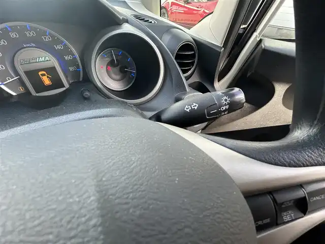 ホンダ フィット ハイブリット スマート セレクション 愛知県 2011(平23)年 15.6万km プレミアムホワイトパール ワンオーナー/社外7V型メモリナビ【Bluetooth SD ワンセグ　FM AM 品：AVIC-MRZ99】/ETC/ドライブレコーダー/オートライト/クルーズコントロール/自動駐車システム/ステアリングリモコン/電動格納ドアミラー/純正フロアマット/Wエアバック/取扱説明書