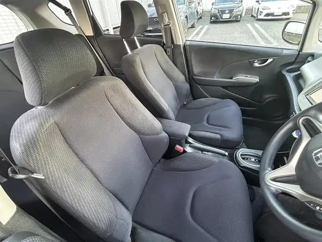 ホンダ フィット ハイブリット スマート セレクション 愛知県 2011(平23)年 15.6万km プレミアムホワイトパール ワンオーナー/社外7V型メモリナビ【Bluetooth SD ワンセグ　FM AM 品：AVIC-MRZ99】/ETC/ドライブレコーダー/オートライト/クルーズコントロール/自動駐車システム/ステアリングリモコン/電動格納ドアミラー/純正フロアマット/Wエアバック/取扱説明書