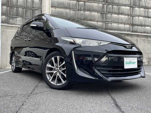 トヨタ エスティマ アエラス プレミアム 愛知県 2017(平29)年 6.9万km ブラック ワンオーナー/禁煙車/純正10.5インチSDナビ/フルセグTV・CD・DVD・SD・Bluetooth/バックカメラ/純正後席フリップダウンモニター/両側パワースライドドア/前後ドライブレコーダー（MDR-CAM）/トヨタセーフティーセンス/・プリクラッシュセーフティ/・レーンディパーチャーアラート/・先行車発進お知らせ機能/・クルーズコントロール/・オートハイビーム/運転席パワーシート/ハーフレザーシート/純正18インチAW/100V電源/LEDヘッドライト/オートライト/ETC/プッシュスタート/スマートキー/純正フロアマット/純正ドアバイザー/保証書/取扱説明書/スペアスマートキー/整備記録簿