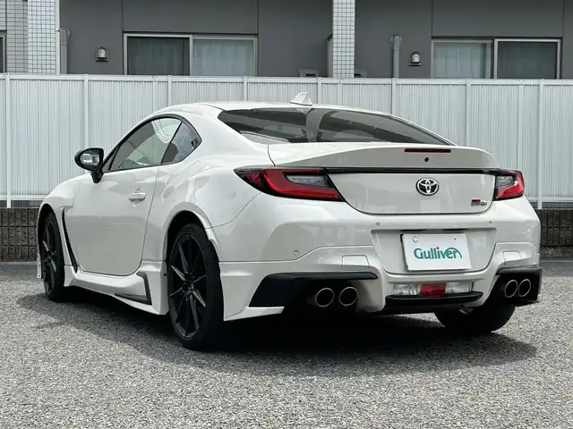 トヨタ ＧＲ８６ RZ 愛知県 2024(令6)年 2.6万km クリスタルホワイトパール ワンオーナー/純正メモリナビ/(FM/AM/CD/DVD/BT/USB/iPod/フルセグ)/アイサイト/・全車速追従クルーズコントロール/・後側方警戒支援システム/・後退時ブレーキアシスト/・リアコーナーセンサー/プリクラッシュブレーキ/純正GRマフラー/GRエアロ/バックカメラ/ドライブレコーダー/ハーフレザーシート/シートヒーター/純正AW18インチ/パドルシフト/LEDヘッドライト/ETC/電動格納ミラー/革巻きステアリング/プッシュスタート/スマートキー・スペアキー１本/ステアリングリモコン/ハンズフリー/ABS/保証書