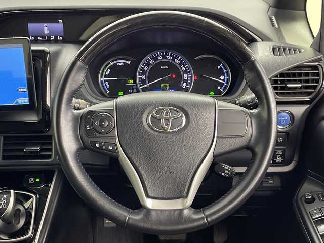 トヨタ エスクァイア ハイブリッド Gi 愛知県 2014(平26)年 14.7万km ホワイトパールクリスタルシャイン (株)IDOMが運営する【じしゃロン名古屋鳴海店】の自社ローン専用車両になりますこちらは現金またはオートローンご利用時の価格です。自社ローンご希望の方は別途その旨お申付け下さい/ ワンオーナー/社外ナビ/（フルセグ/DVD/CD）/フリップダウンモニター/両側パワースライドドア/クルーズコントロール/ワイヤレス充電/レザーシート/シートヒーター/ビルドインETC/リアサンシェード/スマートキー/プッシュスタートボタン/純正フロアマット