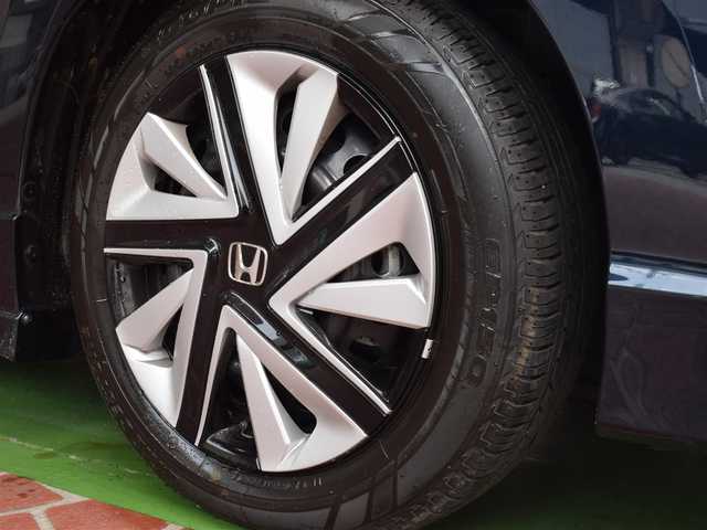 ホンダ シャトル ハイブリッド X ホンダセンシング 神奈川県 2019(令1)年 0.7万km ミッドナイトブルービームM ワンオーナー/新車時保証書/取扱説明書/前後ドラレコ/純正SDナビ/(フルセグTV/CD/DVD/SD/BT/USB)/バックカメラ/衝突軽減防止＆警報/車線逸脱防止＆警報/アダプティブクルーズコントロール/先行車発進検知/ロードサインアシスト/パーキングアシスト/シートヒーター(D＋N席)/デュアルオートエアコン/革巻きステアリング/ステアリングスイッチ/パドルシフト/オートライト/横滑り防止/プッシュスタート＆スマートキー/ウインカー付き電動格納ミラー/スペアキー/ドアバイザー/LEDヘッドライト/フォグランプ/純正フロアマット
