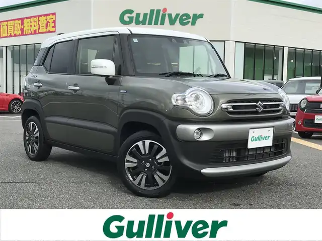 スズキ クロスビー HYBRID MZ 鳥取県 2024(令6)年 0.7万km タフカーキパールメタリック/ホワイト2トーン ターボ車/純正8インチナビ/フルセグ/CD/DVD/BT/USB/全方位カメラ/スズキセーフティサポート/レーンキープアシスト/レーダークルーズコントロール/コーナーセンサー/前席シートヒーター/パドルシフト/LEDヘットライト/フォグライト/純正16インチアルミホイール/プッシュエンジンスタート/アイドリングストップ/スマートキー/フロアマット/ドアバイザー