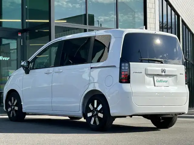 ホンダ フリード ハイブリット e:HEV AIR EX 愛媛県 2025(令7)年 0.1千km プラチナホワイトパール 純正ナビ（Bluetooth/フルセグTV）/アダプティブクルーズコントロール/バックカメラ/AppleCarPlay/AndroidAuto/3列シート/ウォークスルー/両側パワースライドドア/純正15インチアルミホイール/ホンダセンシング/ブラインドスポットモニター/ステアリングリモコン/前後コーナーセンサー/LEDヘッドライト/スマートキー