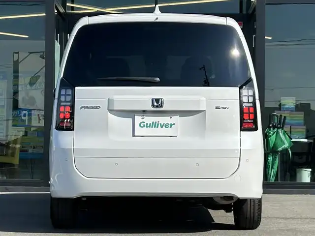 ホンダ フリード ハイブリット e:HEV AIR EX 愛媛県 2025(令7)年 0.1千km プラチナホワイトパール 純正ナビ（Bluetooth/フルセグTV）/アダプティブクルーズコントロール/バックカメラ/AppleCarPlay/AndroidAuto/3列シート/ウォークスルー/両側パワースライドドア/純正15インチアルミホイール/ホンダセンシング/ブラインドスポットモニター/ステアリングリモコン/前後コーナーセンサー/LEDヘッドライト/スマートキー