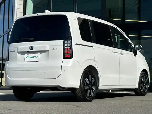 ホンダ フリード ハイブリット e:HEV AIR EX 愛媛県 2025(令7)年 0.1千km プラチナホワイトパール 純正ナビ（Bluetooth/フルセグTV）/アダプティブクルーズコントロール/バックカメラ/AppleCarPlay/AndroidAuto/3列シート/ウォークスルー/両側パワースライドドア/純正15インチアルミホイール/ホンダセンシング/ブラインドスポットモニター/ステアリングリモコン/前後コーナーセンサー/LEDヘッドライト/スマートキー