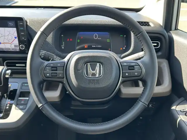 ホンダ フリード ハイブリット e:HEV AIR EX 愛媛県 2025(令7)年 0.1千km プラチナホワイトパール 純正ナビ（Bluetooth/フルセグTV）/アダプティブクルーズコントロール/バックカメラ/AppleCarPlay/AndroidAuto/3列シート/ウォークスルー/両側パワースライドドア/純正15インチアルミホイール/ホンダセンシング/ブラインドスポットモニター/ステアリングリモコン/前後コーナーセンサー/LEDヘッドライト/スマートキー