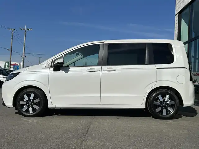 ホンダ フリード ハイブリット e:HEV AIR EX 愛媛県 2025(令7)年 0.1千km プラチナホワイトパール 純正ナビ（Bluetooth/フルセグTV）/アダプティブクルーズコントロール/バックカメラ/AppleCarPlay/AndroidAuto/3列シート/ウォークスルー/両側パワースライドドア/純正15インチアルミホイール/ホンダセンシング/ブラインドスポットモニター/ステアリングリモコン/前後コーナーセンサー/LEDヘッドライト/スマートキー