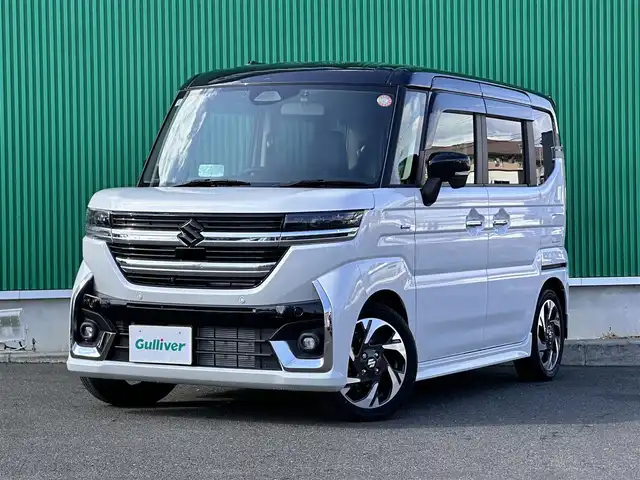 スズキ スペーシア カスタム HYBRID XS ターボ 宮城県 2024(令6)年 0.3万km ピュアホワイトパール/ブラック2トーン 全方位モニター付メモリーナビゲーション/・メモリーナビゲーション/・9インチディスプレイ/・地デジTV/・AM/FMラジオ/・スマートフォン連携/（AppleCarPlay/AndroidAuto）/・全方位モニター用カメラ/・USBソケット/＝＝＝/ワンオーナー/セーフティサポート/・デュアルセンサーブレーキサポート2/・誤発進抑制機能（前方/後方）/・低速時ブレーキサポート（前進/後退）/・車線逸脱警報機能/・車線逸脱抑制機能/・車線維持支援機能/・ふらつき警報機能/・発進お知らせ機能/・標識認識機能/・ハイビームアシスト/・アダプティブクルーズコントロール/ETC/前後ドライブレコーダー/両側パワースライドドア/ハーフレザーシート/シートヒーター/ステアリングヒーター/革巻きステアリング/パドルシフト/LEDヘッドランプ/フォグランプ/オートライト/スマートキー＆プッシュスタート/アイドリングストップ/純正15インチアルミホイール/ドアバイザー/フロアマット/W/サイド/カーテンエアバッグ
