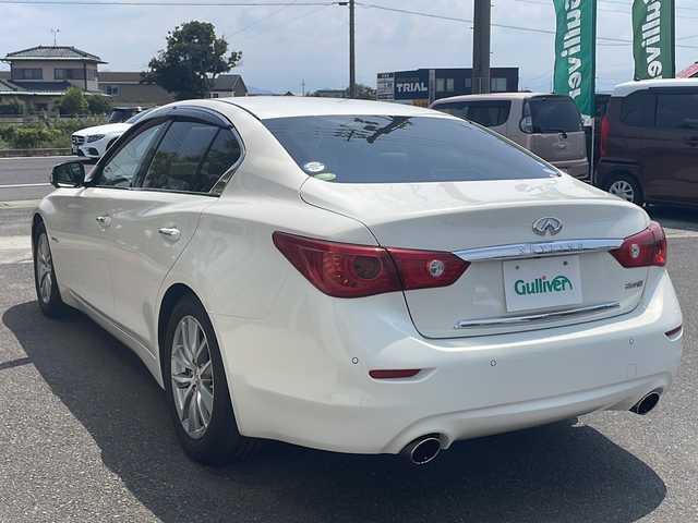 日産 スカイライン ハイブリッド 350GT Type P 香川県 2015(平27)年 3.8万km クリスタルホワイトパール ワンオーナー/純正ナビ／フルセグＴＶ/全方位カメラ/ＬＥＤヘッドライト/コーナーセンサー/レザーシート/シートヒーター/レーダークルーズ/ＥＴＣ/純正ドライブレコーダー/１７インチアルミ/パワーシート/ディーラー記録簿有り