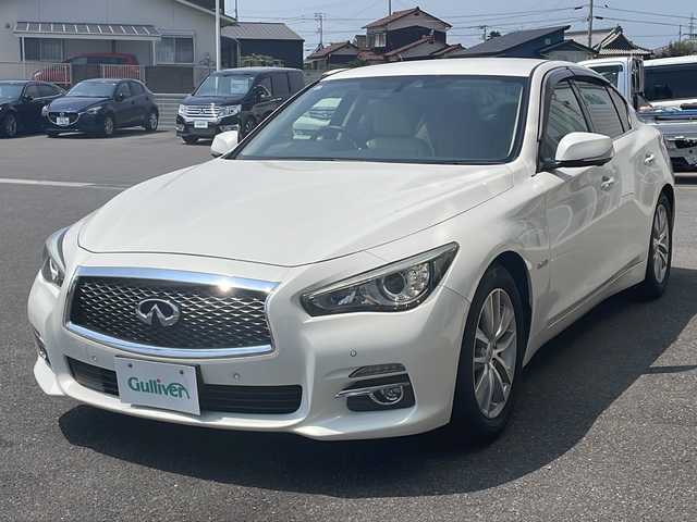 日産 スカイライン ハイブリッド 350GT Type P 香川県 2015(平27)年 3.8万km クリスタルホワイトパール ワンオーナー/純正ナビ／フルセグＴＶ/全方位カメラ/ＬＥＤヘッドライト/コーナーセンサー/レザーシート/シートヒーター/レーダークルーズ/ＥＴＣ/純正ドライブレコーダー/１７インチアルミ/パワーシート/ディーラー記録簿有り
