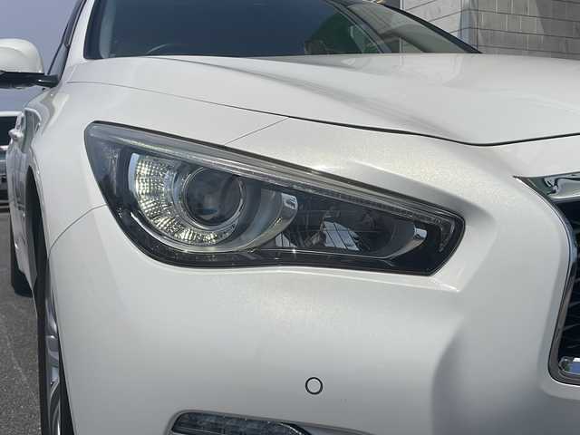 日産 スカイライン ハイブリッド 350GT Type P 香川県 2015(平27)年 3.8万km クリスタルホワイトパール ワンオーナー/純正ナビ／フルセグＴＶ/全方位カメラ/ＬＥＤヘッドライト/コーナーセンサー/レザーシート/シートヒーター/レーダークルーズ/ＥＴＣ/純正ドライブレコーダー/１７インチアルミ/パワーシート/ディーラー記録簿有り
