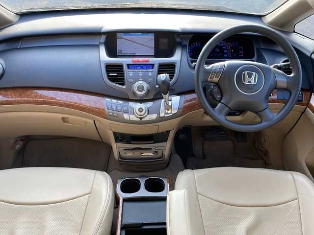 ホンダ オデッセイ M 宮城県 2006(平18)年 9.6万km プレミアムホワイトパール ・サンルーフ・4WD・純正HDDナビ・BT・フルセグTV・バックモニター・レザー調シートカバー・オートライト・社外17インチアルミホイール・フロアマット・リモコンキー