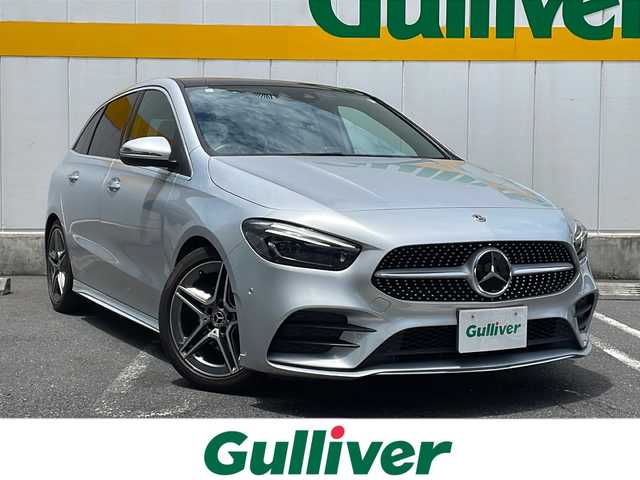 メルセデス・ベンツ Ｂ２００ｄ AMGライン 東京都 2019(令1)年 3.6万km イリジウムシルバー サンルーフ/純正ナビ/USB/Bluetooth/フルセグTV/バックカメラ/アクティブブレーキアシスト/アクティブレーンキーピングアシスト/アクティブパーキングアシスト/ブラインドスポットモニター/クルーズコントロール/ハーフレザーシート/前席パワーシート/前席シートヒーター/パドルシフト付き革巻きステアリング/ドライブレコーダー/ビルトインETC2.0/スマートキー×2/純正フロアマット/取扱説明書/ナビ取扱説明書/保証書