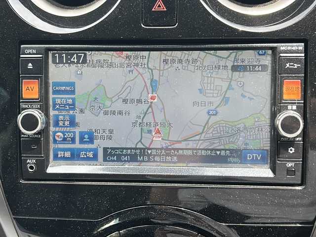 日産 ノート X 京都府 2015(平27)年 9.1万km ラディアントレッド ワンオーナー/純正ナビ/・BT Audio/フルセグTV/CD/DVD/バックカメラ/衝突被害軽減装置/レーンアシスト/横滑り防止装置/ETC/アイドリングストップ/プッシュスタート/ステアリングスイッチ/オートリトラクタブルミラー/純正ドアバイザー/純正フロアマット/保証書/取扱説明書
