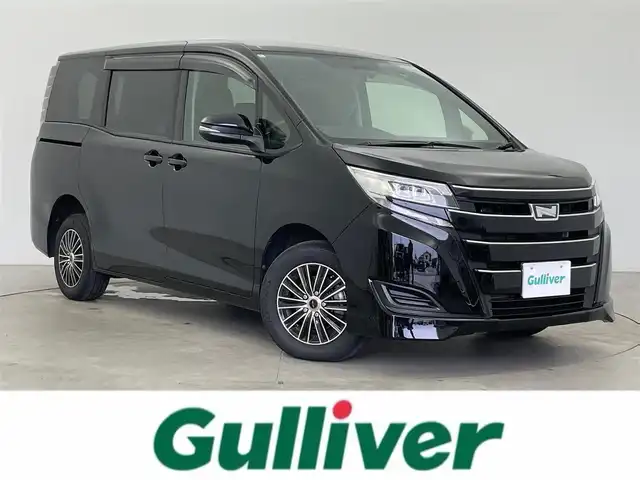 トヨタ ノア X 富山県 2018(平30)年 5.1万km ブラック 純正ナビ（AM/FM/CD/AUX/USB/BT）/ワンセグTV/バックカメラ/片側パワースライドドア/クルーズコントロール/横滑り防止装置/オートライト/LEDヘッドライト/ビルトインETC/リモコンキー/スペアキー有/アイドリングストップ/ドアバイザー/シートカバー/純正フロアマット/社外１５インチAW