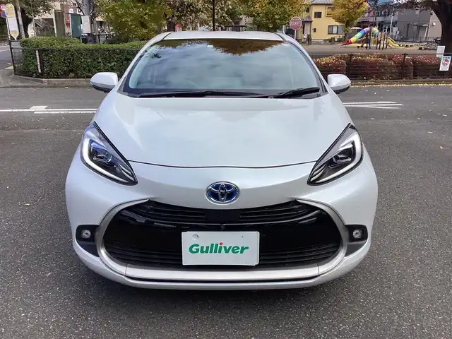 トヨタ アクア Z 神奈川県 2023(令5)年 1.2万km プラチナホワイトパールマイカ ワンオーナー/Toyota Safety Sense/・プリクラッシュセーフティ/・レーントレーシングアシスト/・オートマチックハイビーム/・レーダークルーズコントロール/・ブラインドスポットモニター/・クリアランスソナー/パノラミックビューモニター/プッシュスタート/純正10.5インチナビ/フルセグTV/ETC/100V電源/LEDヘッドライト/ドアバイザー/16インチ純正アルミホイール/スマートキー