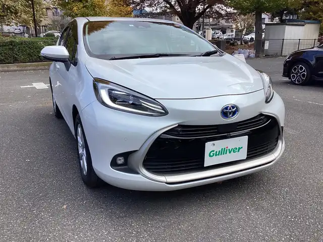 トヨタ アクア Z 神奈川県 2023(令5)年 1.2万km プラチナホワイトパールマイカ ワンオーナー/Toyota Safety Sense/・プリクラッシュセーフティ/・レーントレーシングアシスト/・オートマチックハイビーム/・レーダークルーズコントロール/・ブラインドスポットモニター/・クリアランスソナー/パノラミックビューモニター/プッシュスタート/純正10.5インチナビ/フルセグTV/ETC/100V電源/LEDヘッドライト/ドアバイザー/16インチ純正アルミホイール/スマートキー