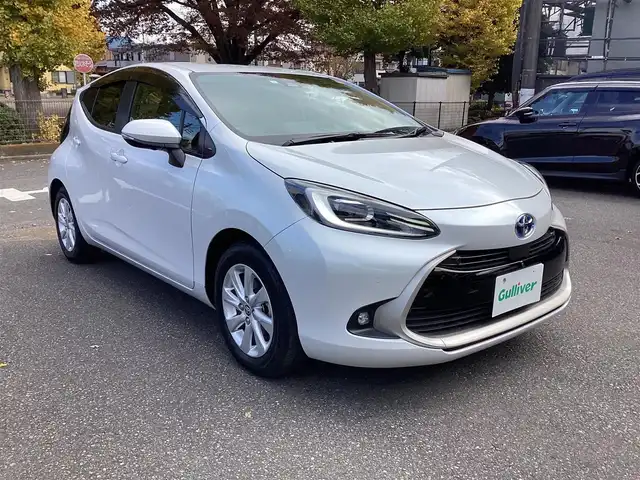 トヨタ アクア Z 神奈川県 2023(令5)年 1.2万km プラチナホワイトパールマイカ ワンオーナー/Toyota Safety Sense/・プリクラッシュセーフティ/・レーントレーシングアシスト/・オートマチックハイビーム/・レーダークルーズコントロール/・ブラインドスポットモニター/・クリアランスソナー/パノラミックビューモニター/プッシュスタート/純正10.5インチナビ/フルセグTV/ETC/100V電源/LEDヘッドライト/ドアバイザー/16インチ純正アルミホイール/スマートキー