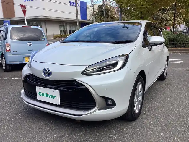 トヨタ アクア Z 神奈川県 2023(令5)年 1.2万km プラチナホワイトパールマイカ ワンオーナー/Toyota Safety Sense/・プリクラッシュセーフティ/・レーントレーシングアシスト/・オートマチックハイビーム/・レーダークルーズコントロール/・ブラインドスポットモニター/・クリアランスソナー/パノラミックビューモニター/プッシュスタート/純正10.5インチナビ/フルセグTV/ETC/100V電源/LEDヘッドライト/ドアバイザー/16インチ純正アルミホイール/スマートキー