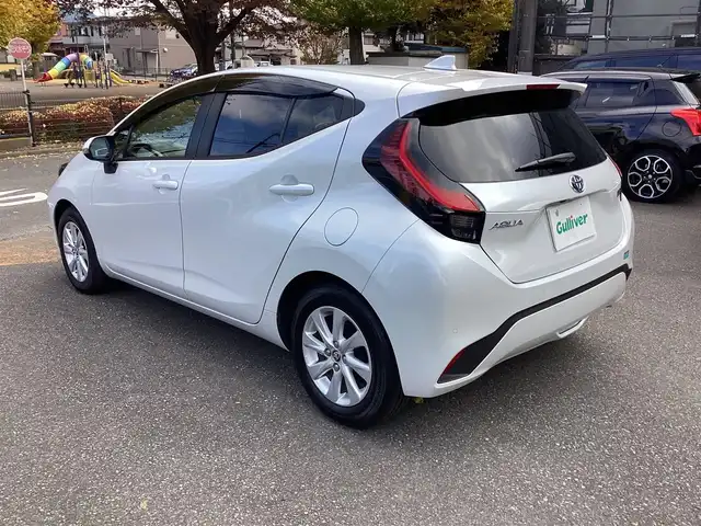 トヨタ アクア Z 神奈川県 2023(令5)年 1.2万km プラチナホワイトパールマイカ ワンオーナー/Toyota Safety Sense/・プリクラッシュセーフティ/・レーントレーシングアシスト/・オートマチックハイビーム/・レーダークルーズコントロール/・ブラインドスポットモニター/・クリアランスソナー/パノラミックビューモニター/プッシュスタート/純正10.5インチナビ/フルセグTV/ETC/100V電源/LEDヘッドライト/ドアバイザー/16インチ純正アルミホイール/スマートキー
