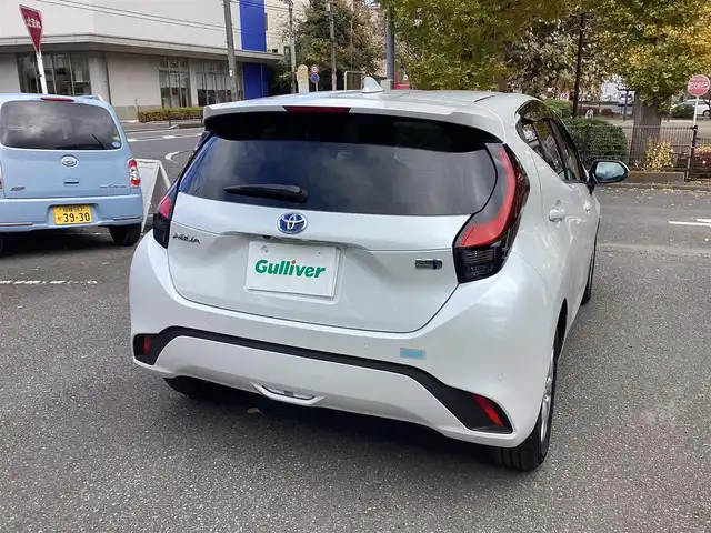 トヨタ アクア Z 神奈川県 2023(令5)年 1.2万km プラチナホワイトパールマイカ ワンオーナー/Toyota Safety Sense/・プリクラッシュセーフティ/・レーントレーシングアシスト/・オートマチックハイビーム/・レーダークルーズコントロール/・ブラインドスポットモニター/・クリアランスソナー/パノラミックビューモニター/プッシュスタート/純正10.5インチナビ/フルセグTV/ETC/100V電源/LEDヘッドライト/ドアバイザー/16インチ純正アルミホイール/スマートキー