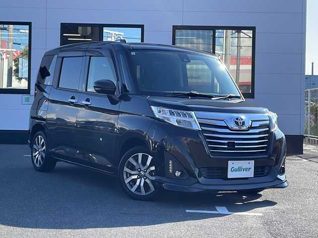 トヨタ ルーミー カスタムG－T 山口県 2017(平29)年 6.6万km ブラックマイカメタリック 純正SDナビ/Bluetoothオーディオ/フルセグテレビ/DVD再生/バックカメラ/Toyota Safety Sense/・衝突回避支援ブレーキ/・車線逸脱警報/・誤発進抑制/・先行車発進告知/・標識認識/・ふらつき警報/・プロアクティブドライビングアシスト/ETC/スマートキー/プッシュスタート/ドアバイザー/純正アルミホイール/両側オートスライドドア/クルーズコントロール/LEDヘッドライト/フォグライト