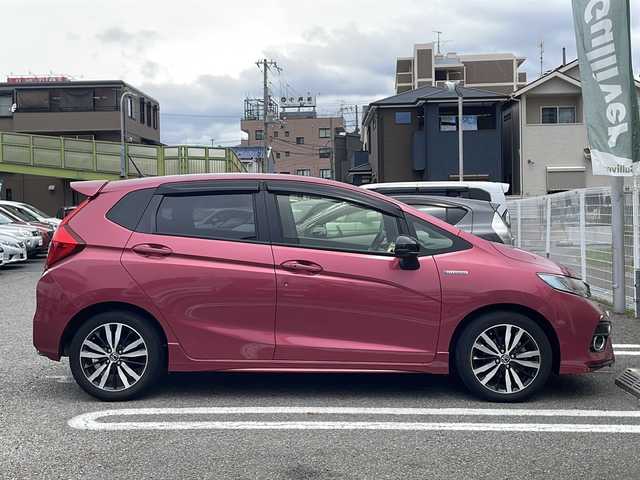 ホンダ フィット ハイブリット S ホンダセンシング 兵庫県 2018(平30)年 7.9万km ルージュアメジストM ワンオーナー/ホンダセンシング/純正ディスプレイオーディオ/地デジTV/Bluetooth/バックカメラ/アダプティブクルーズコントロール/プッシュスタート/スマートキー/ETC/取扱説明書・保証書