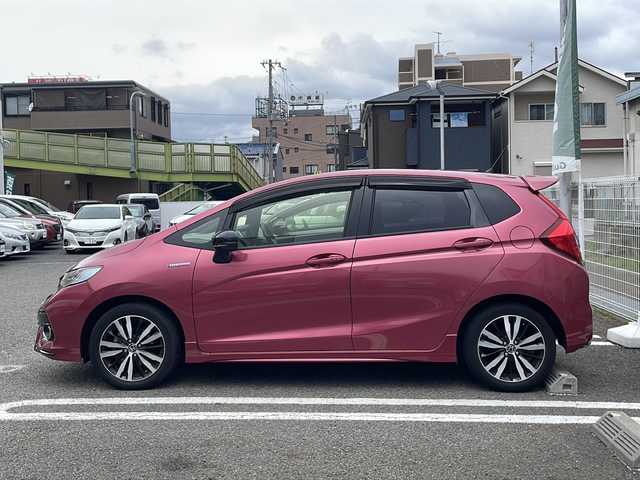 ホンダ フィット ハイブリット S ホンダセンシング 兵庫県 2018(平30)年 7.9万km ルージュアメジストM ワンオーナー/ホンダセンシング/純正ディスプレイオーディオ/地デジTV/Bluetooth/バックカメラ/アダプティブクルーズコントロール/プッシュスタート/スマートキー/ETC/取扱説明書・保証書