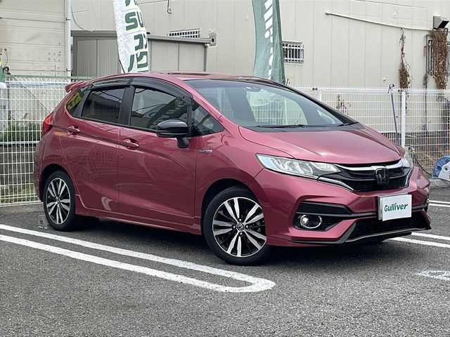 ホンダ フィット ハイブリット S ホンダセンシング 兵庫県 2018(平30)年 7.9万km ルージュアメジストM ワンオーナー/ホンダセンシング/純正ディスプレイオーディオ/地デジTV/Bluetooth/バックカメラ/アダプティブクルーズコントロール/プッシュスタート/スマートキー/ETC/取扱説明書・保証書