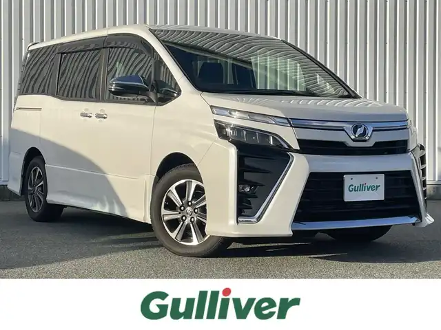 トヨタ ヴォクシー ZS 煌Ⅱ 福岡県 2019(令1)年 2.9万km ホワイトパールクリスタルシャイン トヨタセーフティセンス/PCS/LDA/クリアランスソナー/横滑り防止装置/アルパイン１１型ナビ/フルセグTV/CD/DVD/BT/SD/AM/FM/バックカメラ/両側パワースライドドア/クルーズコントロール/前後ドラレコ/オートハイビーム/ステアリングリモコン/純正１６アルミ/ＥＴＣ/ウォークスルー/スマートキー/プッシュスタート