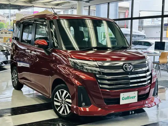 トヨタ ルーミー カスタムG 千葉県 2023(令5)年 0.8万km ファイアークォーツレッドM 登録時７８０２km/車検　令和８年２月１３日迄/ワンオーナー/純正９インチディスプレイオーディオ/・フルセグTV/・Bluetoothオーディオ/・CarPlay/・AndroidAuto/パノラマモニター/純正前後ドライブレコーダー/ビルトインETC/両側パワースライドドア/スマートアシスト/前席シートヒーター/電動パーキング、オートホールド/レーダークルーズコントロール/パーキングセンサー/純正フロアマット、ドアバイザー/純正１４インチアルミホイール/LEDヘッドライト、LEDフォグライト/ロールシェード付きスライドドア/取扱説明書/オーディオ取扱説明書/保証書/スペアスマートキー