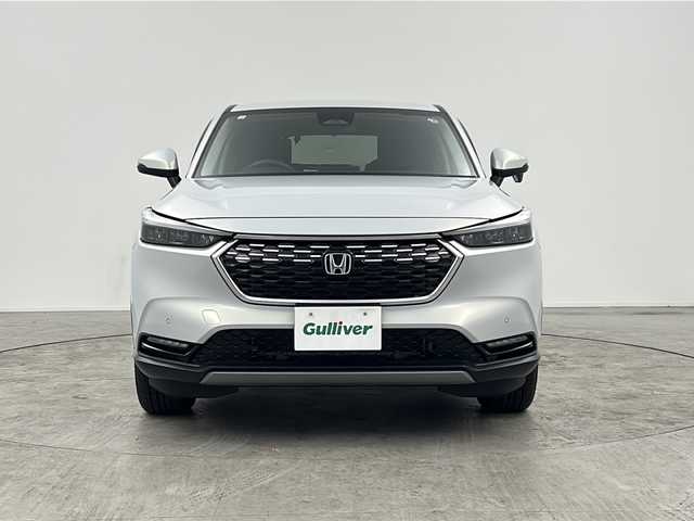 ホンダ ヴェゼル G 三重県 2023(令5)年 1.1万km プレミアムサンライトホワイトパール 禁煙車/純正ナビ/・AM・FM・CD・DVD・BT・USB・HDMI・フルセグ/バックカメラ/ホンダセンシング/衝突軽減/レーンキープ/レーダークルーズ/前後コーナーセンサー/安全支援情報スイッチ/電子パーキングブレーキ/ブレーキホールド/ビルトインETC/オートライト/オートハイビーム/LEDヘッドライト/フォグランプ/ステアリングスイッチ/スマートキー/プッシュスタート/純正16インチアルミ/OPグリル/ダウンヒルアシスト