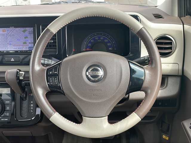 日産 モコ ドルチェX FOUR 青森県 2014(平26)年 6.9万km アーバンブラウン 4WD/社外メモリナビ・ワンセグTV/専用合皮シート/運転席シートヒーター/ビルトインETC/アイドリングストップ/HIDライト/オートライト/フォグランプ/純正14インチアルミ/インテリキー/プッシュスタート/ドアバイザー/純正フロアマット